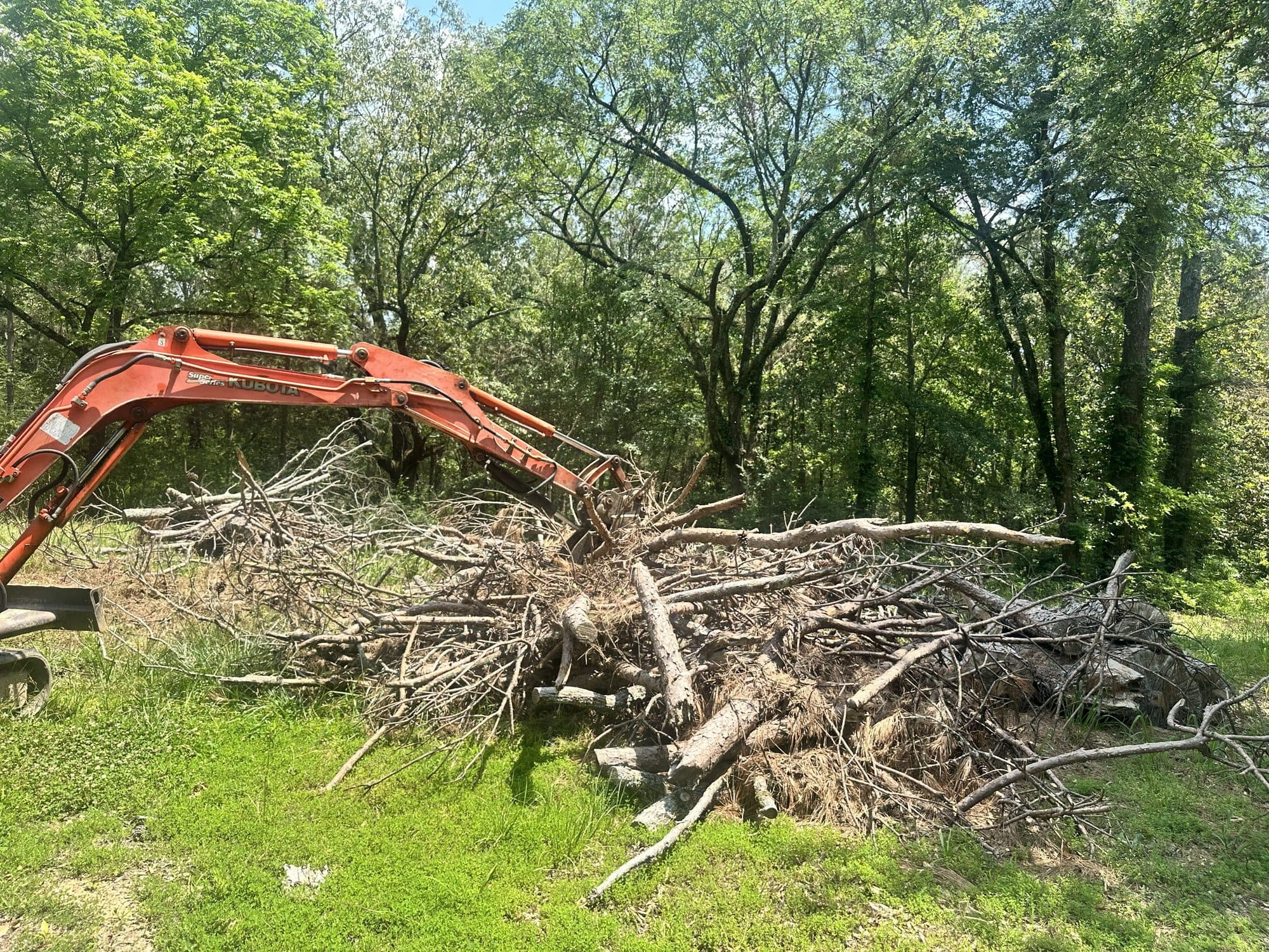 Red Dirt property cleanup work with equipment
